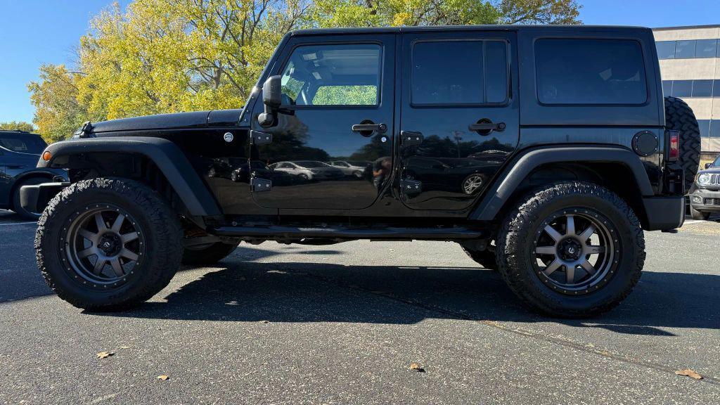 used 2015 Jeep Wrangler Unlimited car, priced at $17,450