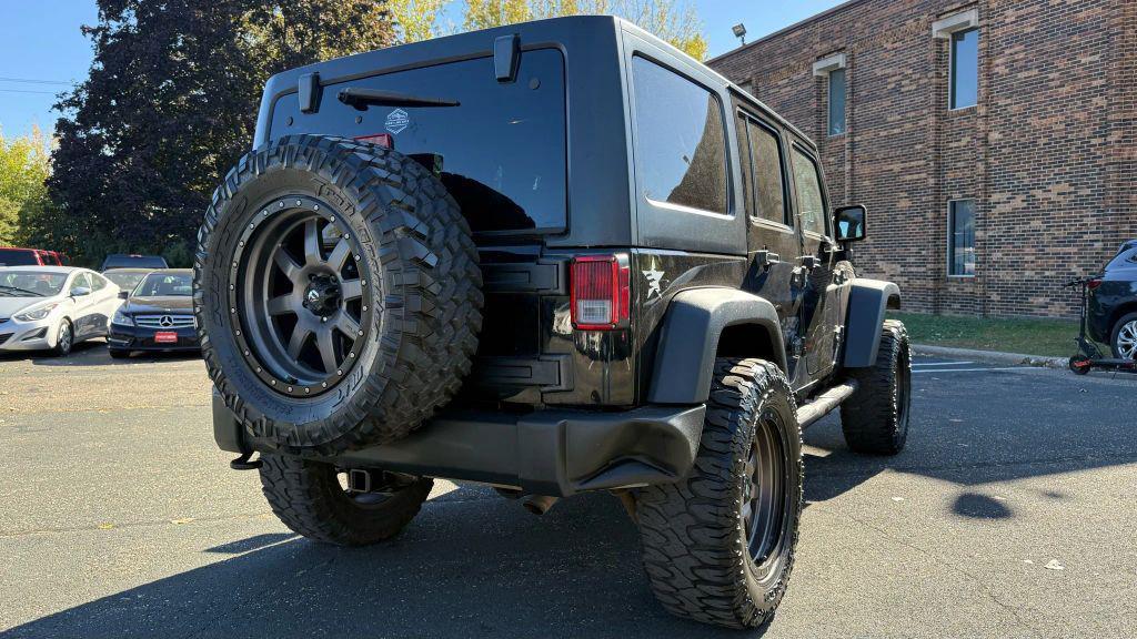used 2015 Jeep Wrangler Unlimited car, priced at $17,450