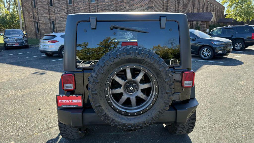 used 2015 Jeep Wrangler Unlimited car, priced at $17,450