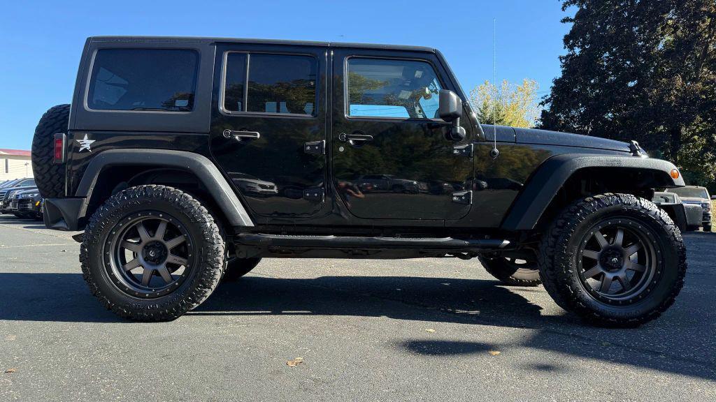 used 2015 Jeep Wrangler Unlimited car, priced at $17,450