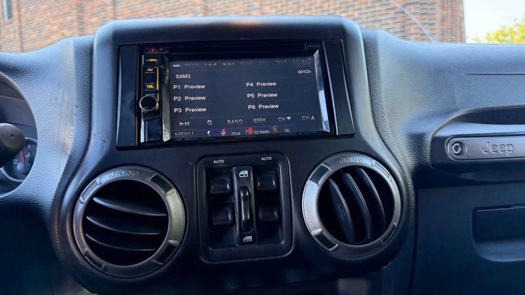 used 2015 Jeep Wrangler Unlimited car, priced at $17,450