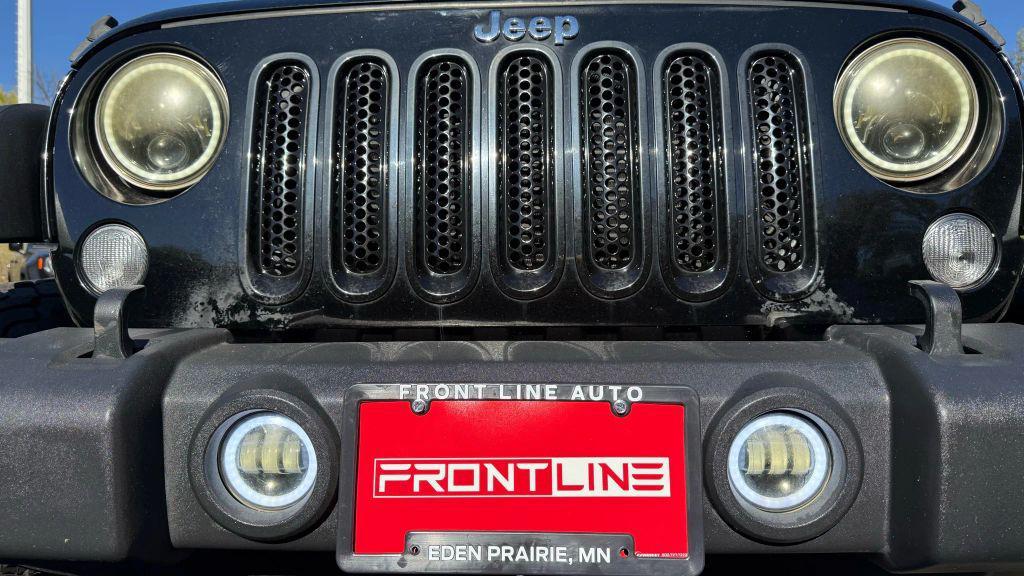 used 2015 Jeep Wrangler Unlimited car, priced at $17,450