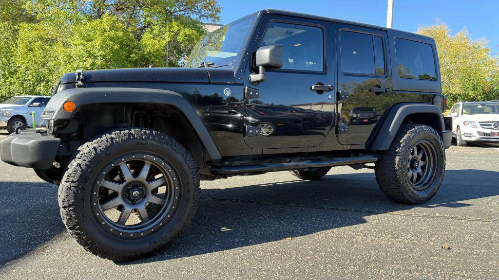 used 2015 Jeep Wrangler Unlimited car, priced at $17,450