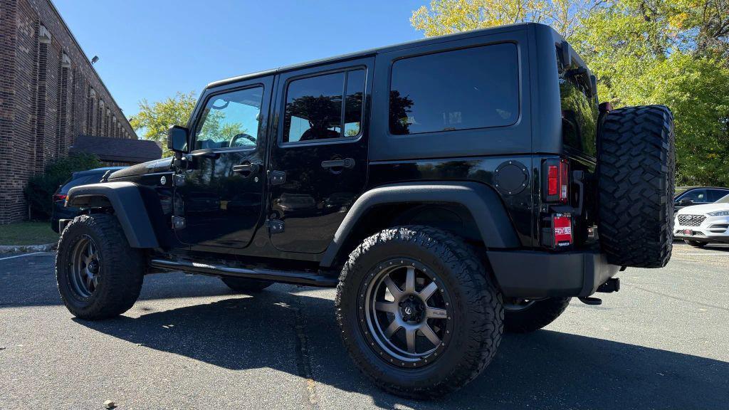 used 2015 Jeep Wrangler Unlimited car, priced at $17,450