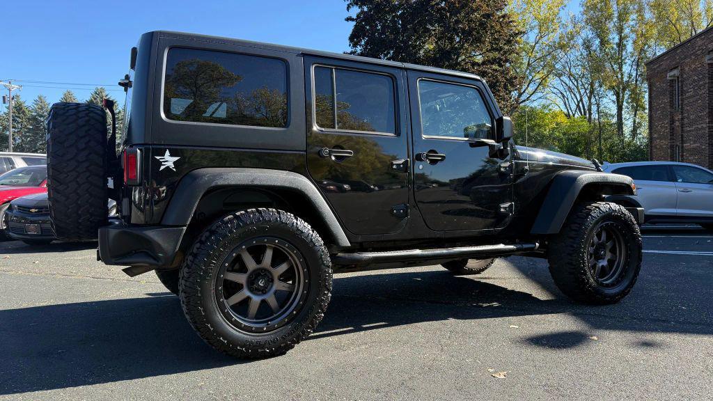 used 2015 Jeep Wrangler Unlimited car, priced at $17,450
