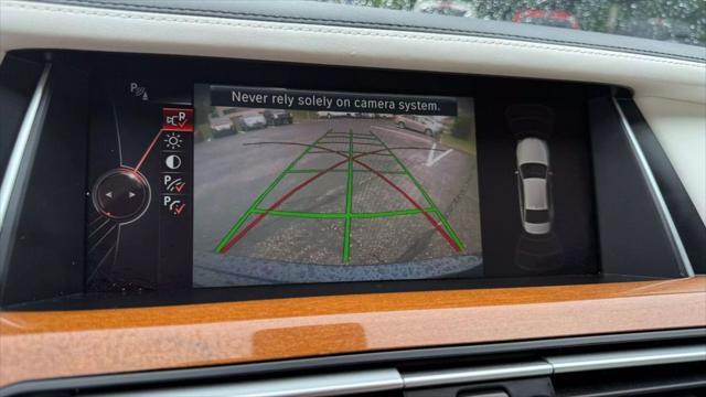 used 2015 BMW 750 car, priced at $14,950
