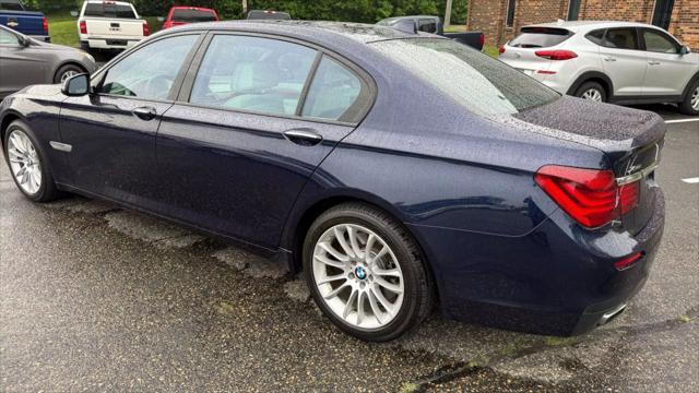 used 2015 BMW 750 car, priced at $14,950