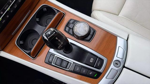 used 2015 BMW 750 car, priced at $14,950