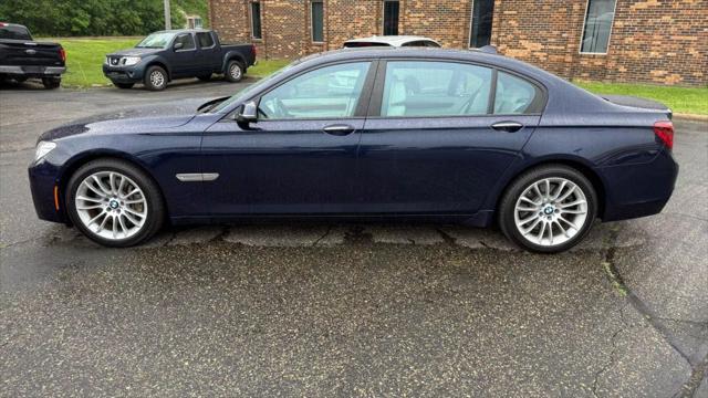 used 2015 BMW 750 car, priced at $14,950