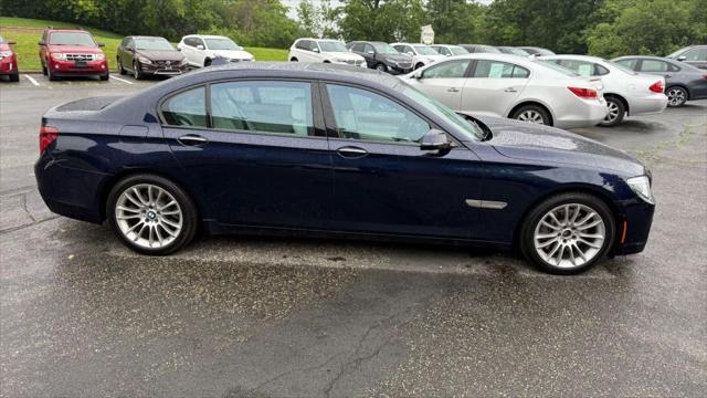 used 2015 BMW 750 car, priced at $14,950
