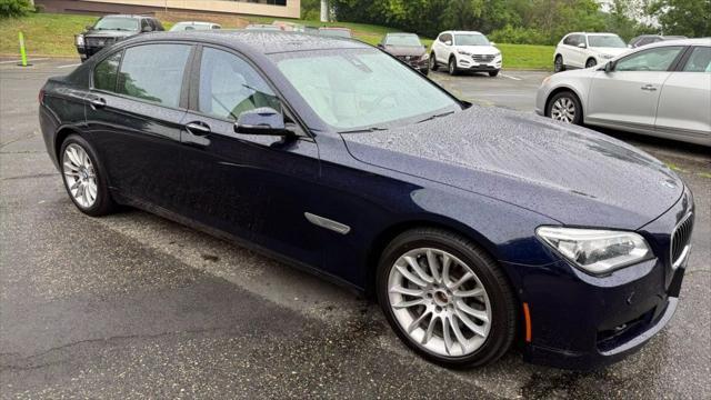 used 2015 BMW 750 car, priced at $14,950
