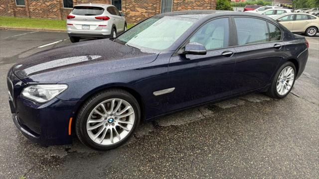 used 2015 BMW 750 car, priced at $14,950
