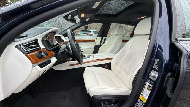 used 2015 BMW 750 car, priced at $14,950