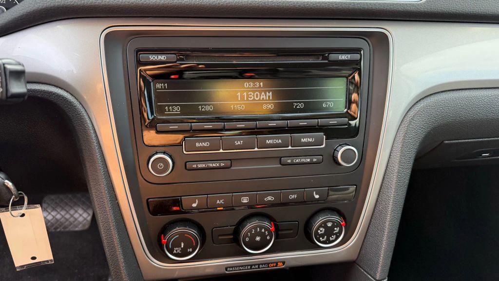 used 2015 Volkswagen Passat car, priced at $7,450