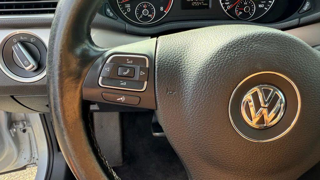 used 2015 Volkswagen Passat car, priced at $7,450
