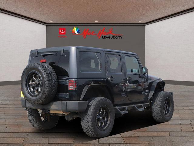 used 2015 Jeep Wrangler Unlimited car, priced at $17,840