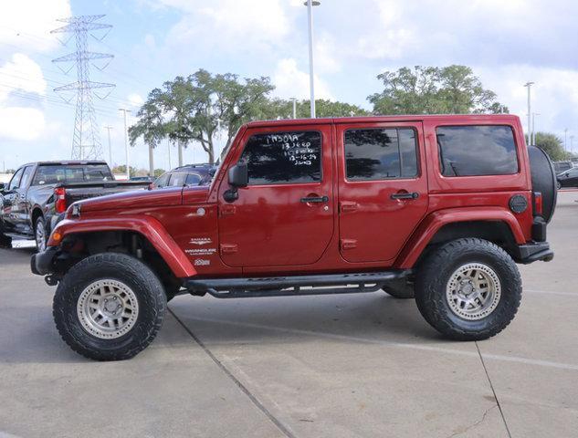 used 2013 Jeep Wrangler Unlimited car, priced at $18,909