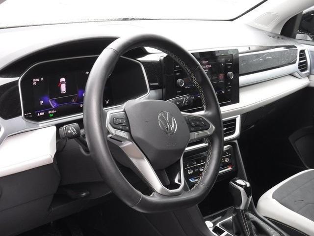 used 2025 Volkswagen Taos car, priced at $31,728