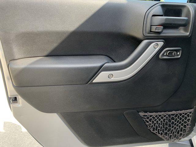 used 2015 Jeep Wrangler Unlimited car, priced at $22,210