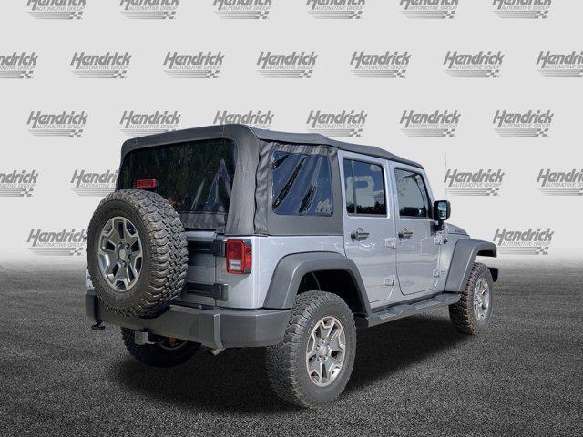 used 2015 Jeep Wrangler Unlimited car, priced at $22,210