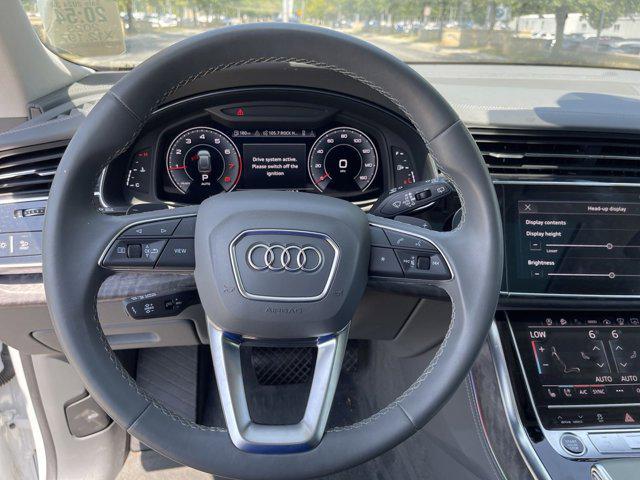 used 2023 Audi Q8 car, priced at $70,556