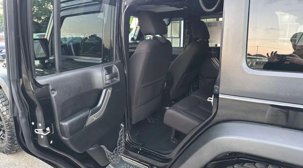 used 2014 Jeep Wrangler Unlimited car, priced at $14,995