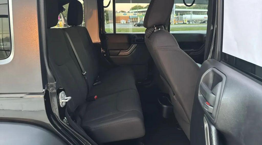 used 2014 Jeep Wrangler Unlimited car, priced at $14,995