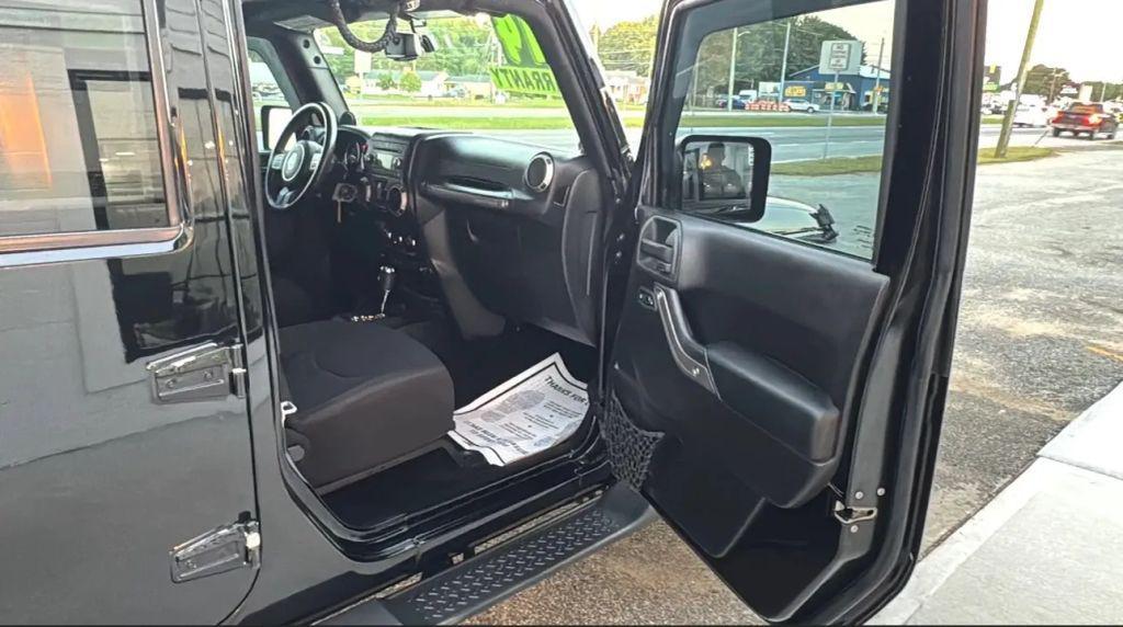 used 2014 Jeep Wrangler Unlimited car, priced at $14,995
