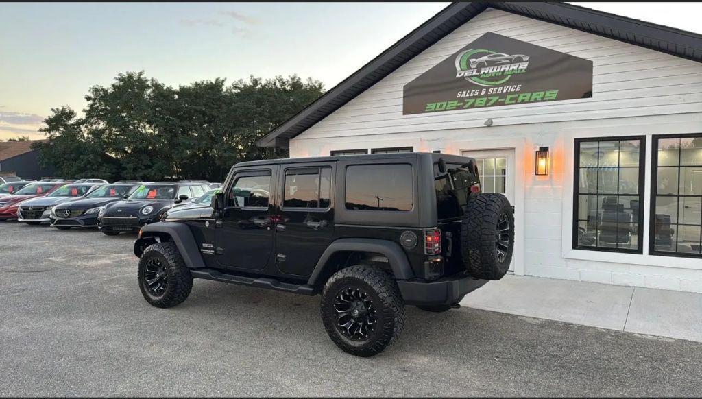used 2014 Jeep Wrangler Unlimited car, priced at $14,995