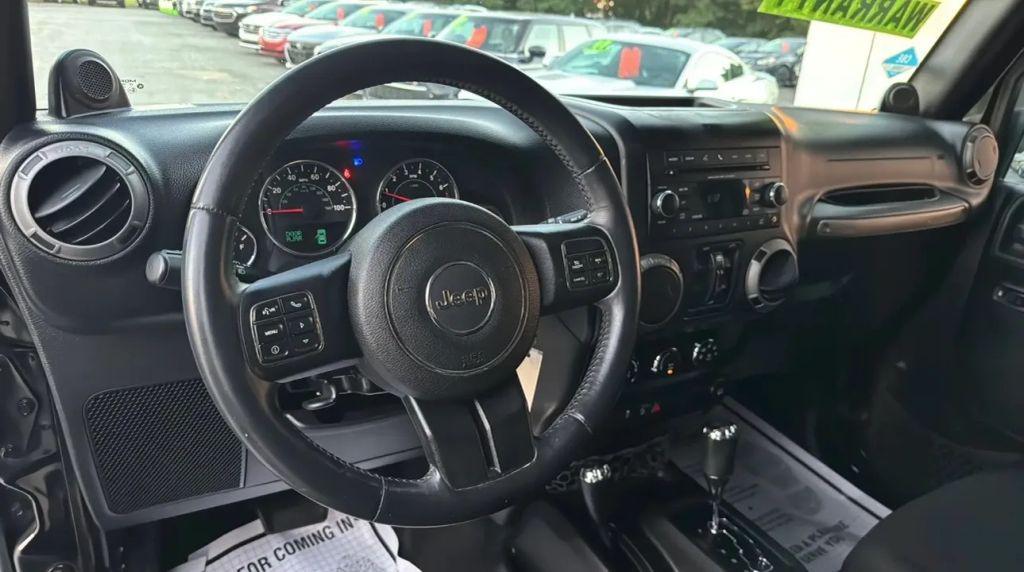 used 2014 Jeep Wrangler Unlimited car, priced at $14,995