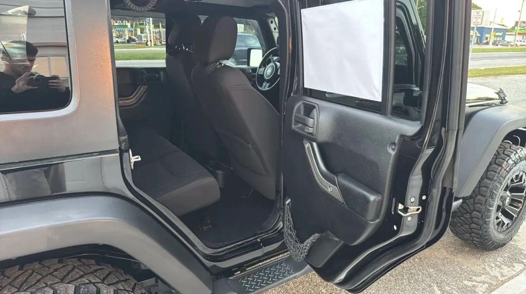 used 2014 Jeep Wrangler Unlimited car, priced at $14,995