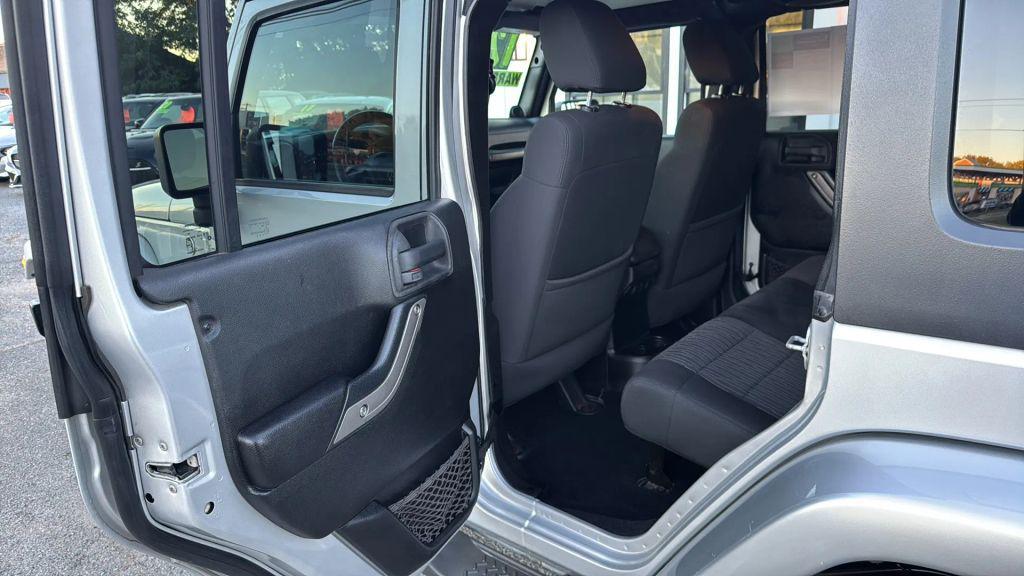 used 2012 Jeep Wrangler Unlimited car, priced at $11,995