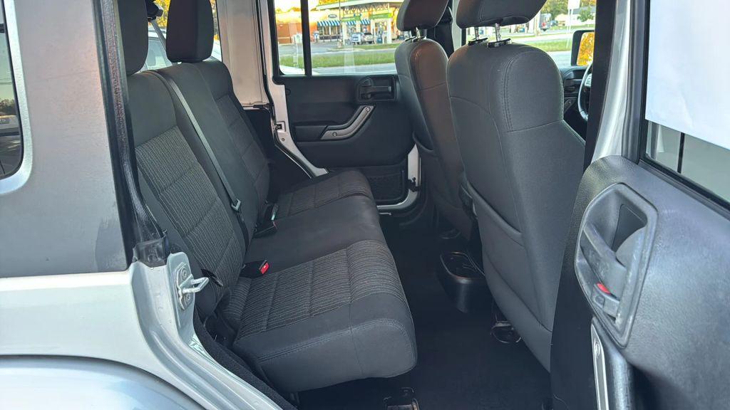 used 2012 Jeep Wrangler Unlimited car, priced at $11,995