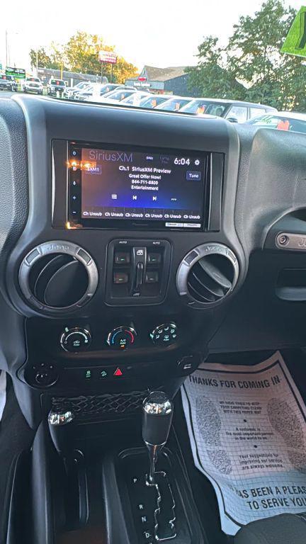 used 2012 Jeep Wrangler Unlimited car, priced at $11,995