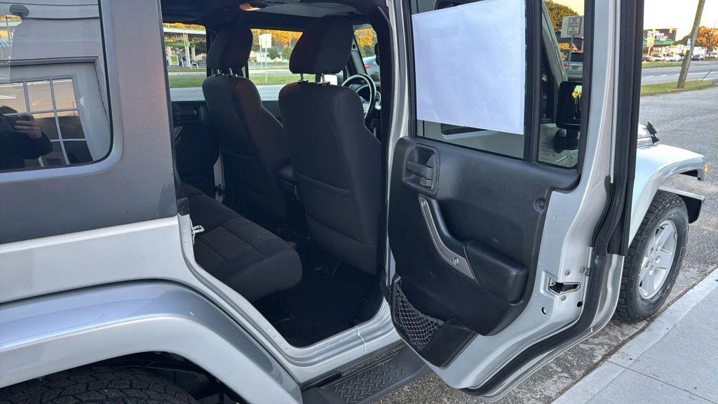 used 2012 Jeep Wrangler Unlimited car, priced at $11,995