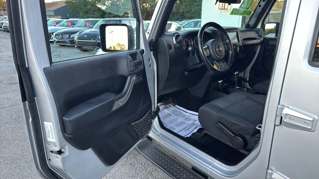 used 2012 Jeep Wrangler Unlimited car, priced at $11,995
