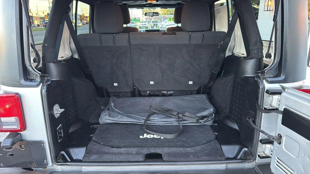used 2012 Jeep Wrangler Unlimited car, priced at $11,995