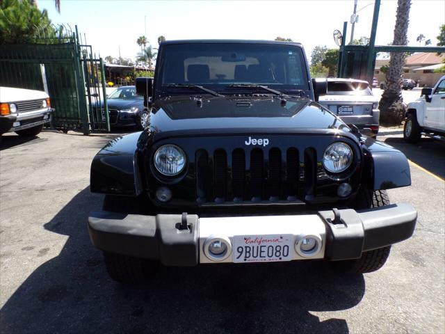 used 2015 Jeep Wrangler car, priced at $18,995