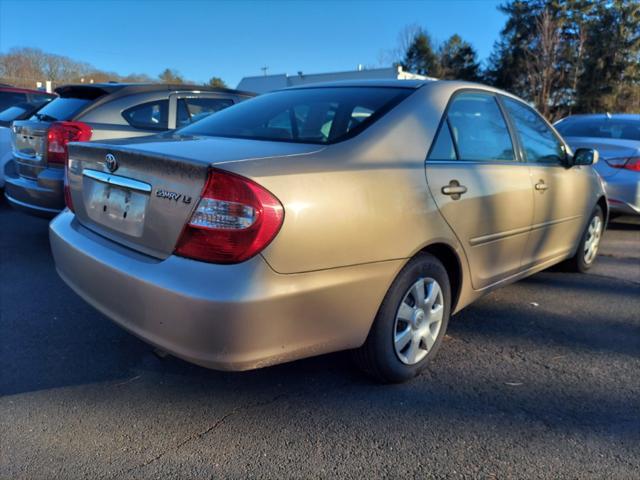 used 2004 Toyota Camry car, priced at $4,995