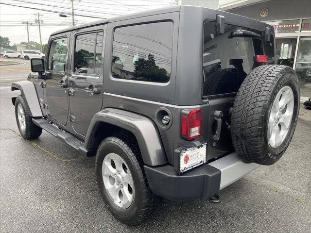 used 2014 Jeep Wrangler Unlimited car, priced at $16,995