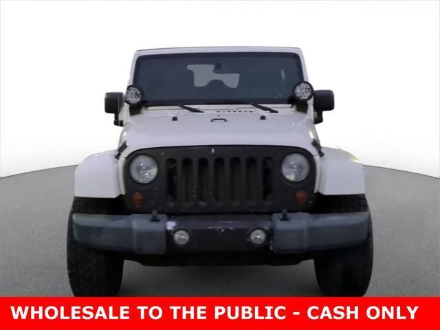 used 2010 Jeep Wrangler Unlimited car, priced at $7,900