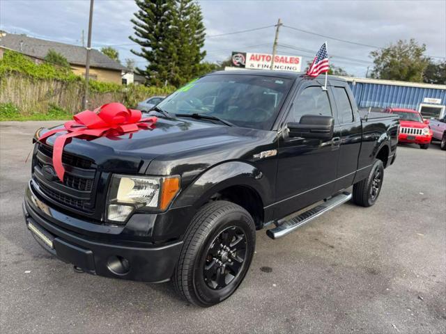 used 2014 Ford F-150 car, priced at $13,000