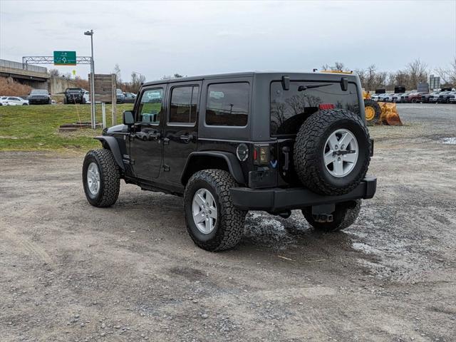used 2018 Jeep Wrangler JK Unlimited car, priced at $21,900