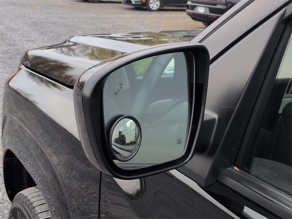 used 2024 Nissan Frontier car, priced at $34,200