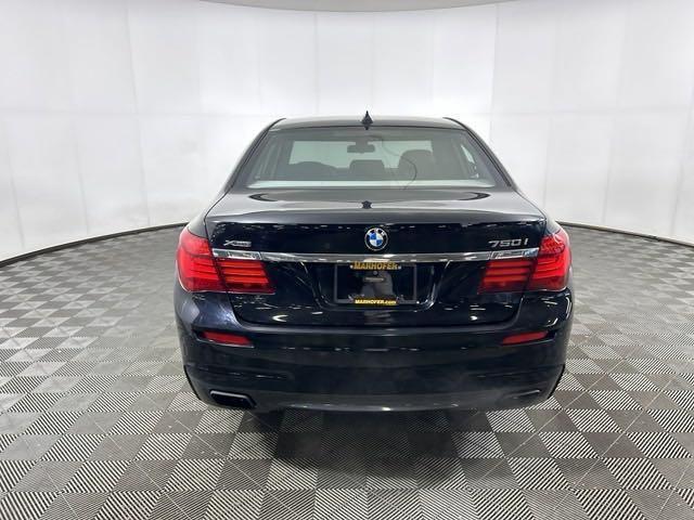 used 2013 BMW 750 car, priced at $13,990