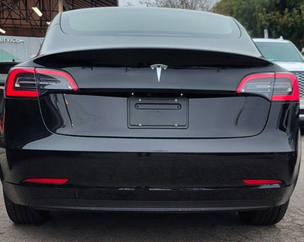 used 2023 Tesla Model 3 car, priced at $22,995