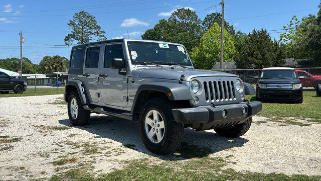 used 2017 Jeep Wrangler Unlimited car, priced at $24,958