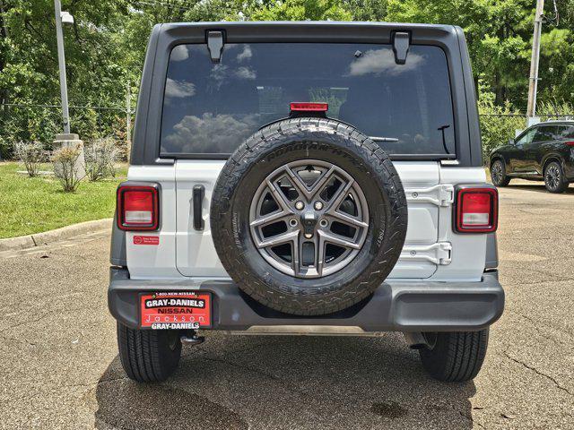 used 2024 Jeep Wrangler car, priced at $33,265