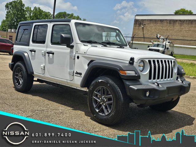 used 2024 Jeep Wrangler car, priced at $33,265