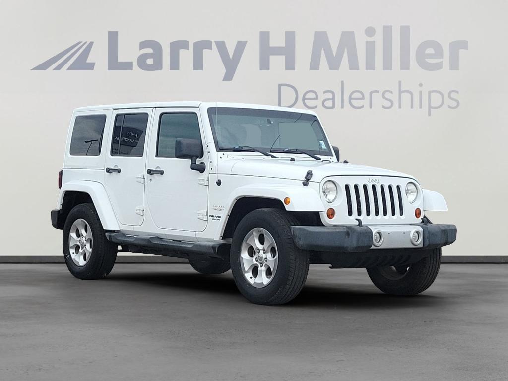 used 2013 Jeep Wrangler Unlimited car, priced at $16,282